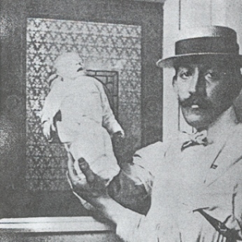 Martin Arthur Couney, neonatal pioneer, with one of the incubator babies, early 20th century.